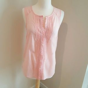 Light peach sleeveless button front top